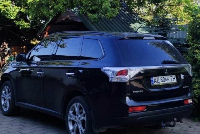 Черный Мицубиси Аутлендер, объемом двигателя 2.4 л и пробегом 220 тыс. км за 13400 $, фото 2 на Automoto.ua