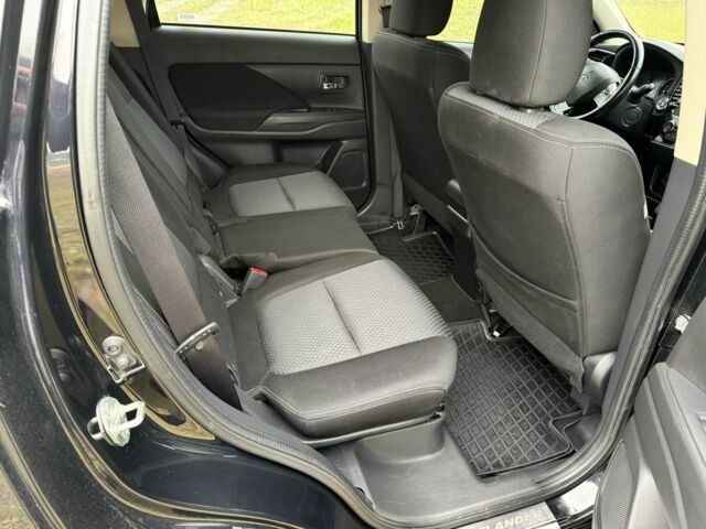 Черный Мицубиси Аутлендер, объемом двигателя 2.4 л и пробегом 130 тыс. км за 14950 $, фото 7 на Automoto.ua