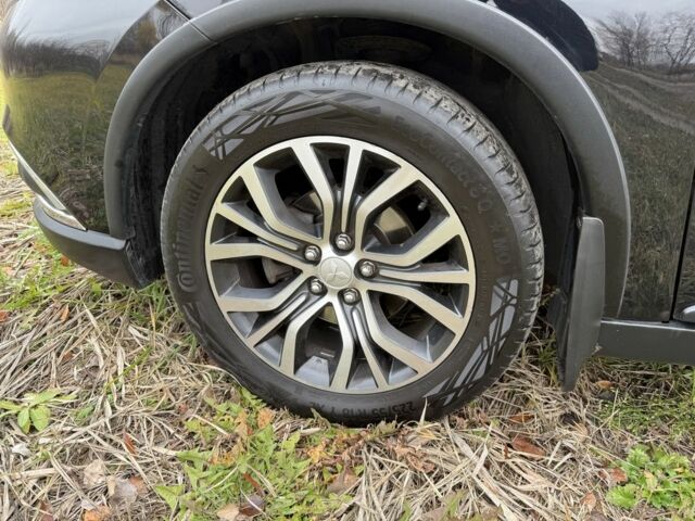 Черный Мицубиси Аутлендер, объемом двигателя 2.4 л и пробегом 130 тыс. км за 14950 $, фото 2 на Automoto.ua