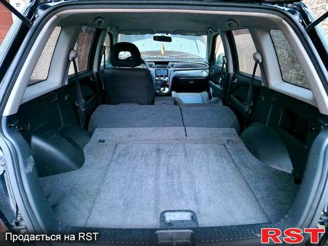 Чорний Міцубісі Аутлендер, об'ємом двигуна 2 л та пробігом 143 тис. км за 8500 $, фото 11 на Automoto.ua