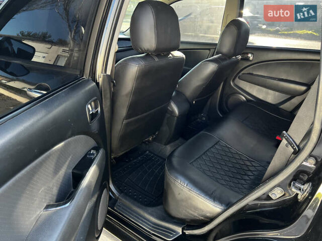 Черный Мицубиси Аутлендер, объемом двигателя 2.4 л и пробегом 267 тыс. км за 6900 $, фото 11 на Automoto.ua