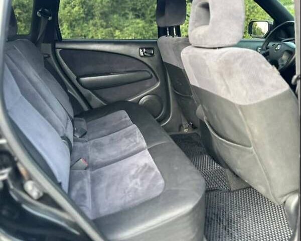 Черный Мицубиси Аутлендер, объемом двигателя 2.38 л и пробегом 212 тыс. км за 4800 $, фото 4 на Automoto.ua