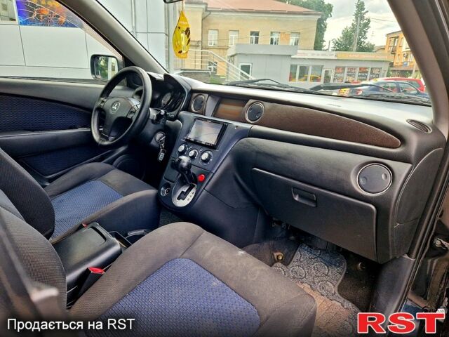 Чорний Міцубісі Аутлендер, об'ємом двигуна 2 л та пробігом 143 тис. км за 8500 $, фото 5 на Automoto.ua