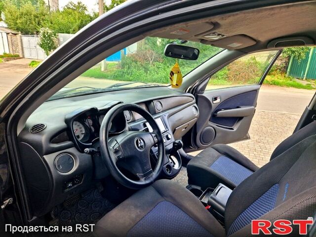 Чорний Міцубісі Аутлендер, об'ємом двигуна 2 л та пробігом 143 тис. км за 8500 $, фото 6 на Automoto.ua