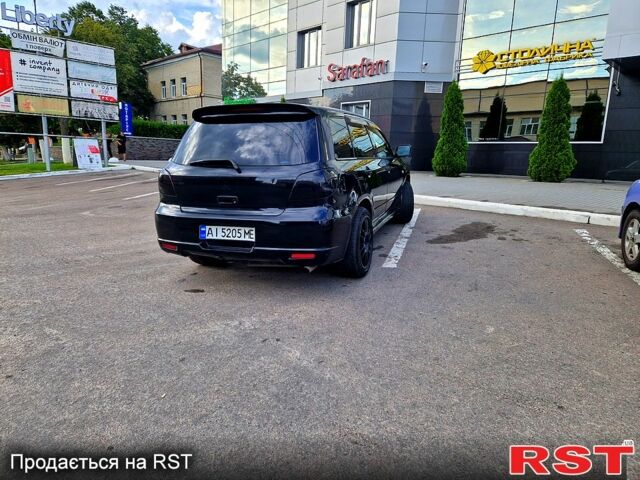 Чорний Міцубісі Аутлендер, об'ємом двигуна 2 л та пробігом 143 тис. км за 8500 $, фото 1 на Automoto.ua