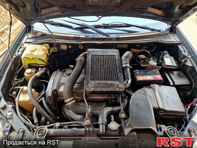 Чорний Міцубісі Аутлендер, об'ємом двигуна 2 л та пробігом 143 тис. км за 8500 $, фото 9 на Automoto.ua