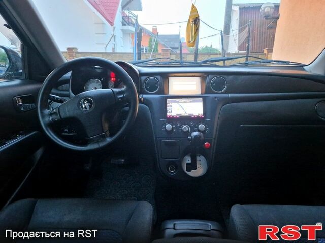 Чорний Міцубісі Аутлендер, об'ємом двигуна 2 л та пробігом 143 тис. км за 8500 $, фото 8 на Automoto.ua