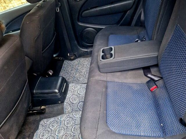 Чорний Міцубісі Аутлендер, об'ємом двигуна 2 л та пробігом 143 тис. км за 8500 $, фото 10 на Automoto.ua