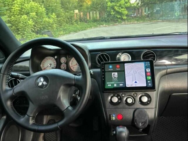 Чорний Міцубісі Аутлендер, об'ємом двигуна 2.4 л та пробігом 212 тис. км за 4800 $, фото 9 на Automoto.ua