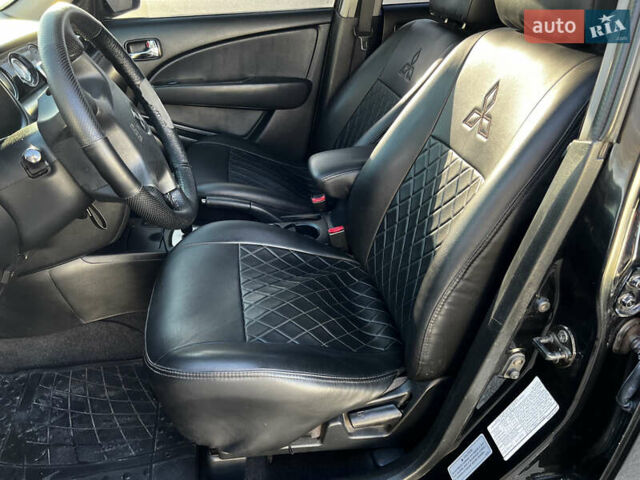 Черный Мицубиси Аутлендер, объемом двигателя 2.4 л и пробегом 267 тыс. км за 6900 $, фото 12 на Automoto.ua