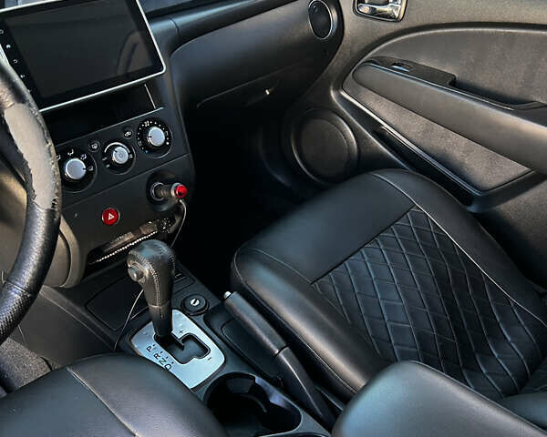 Черный Мицубиси Аутлендер, объемом двигателя 2.4 л и пробегом 267 тыс. км за 6900 $, фото 14 на Automoto.ua