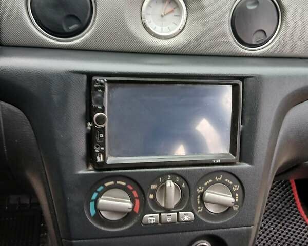 Черный Мицубиси Аутлендер, объемом двигателя 2 л и пробегом 395 тыс. км за 5200 $, фото 13 на Automoto.ua