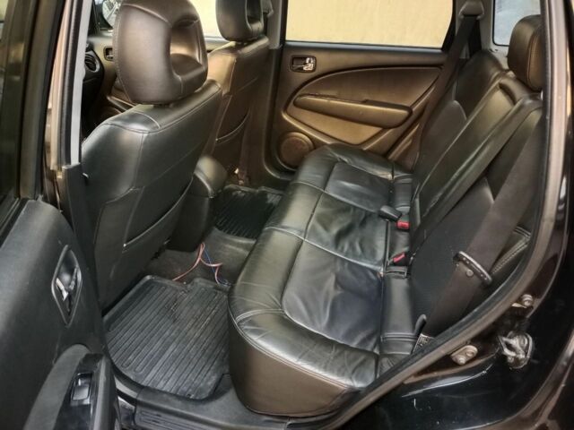 Черный Мицубиси Аутлендер, объемом двигателя 2.4 л и пробегом 243 тыс. км за 1846 $, фото 7 на Automoto.ua