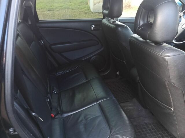 Черный Мицубиси Аутлендер, объемом двигателя 2.4 л и пробегом 269 тыс. км за 5252 $, фото 5 на Automoto.ua