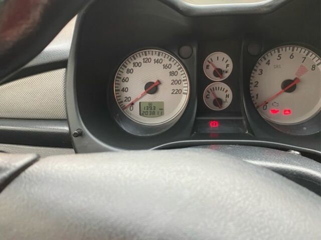 Черный Мицубиси Аутлендер, объемом двигателя 2 л и пробегом 210 тыс. км за 6300 $, фото 8 на Automoto.ua