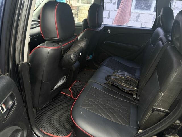 Черный Мицубиси Аутлендер, объемом двигателя 2.4 л и пробегом 3 тыс. км за 5208 $, фото 3 на Automoto.ua