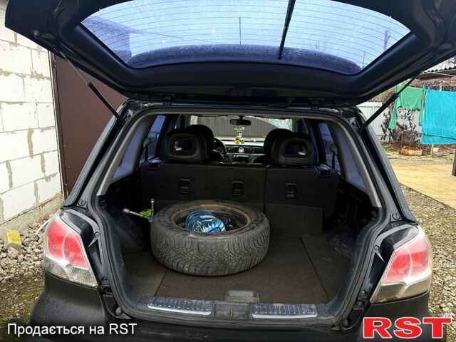 Черный Мицубиси Аутлендер, объемом двигателя 2.4 л и пробегом 357 тыс. км за 5190 $, фото 4 на Automoto.ua