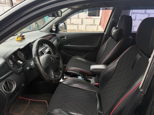 Черный Мицубиси Аутлендер, объемом двигателя 2.4 л и пробегом 3 тыс. км за 5208 $, фото 2 на Automoto.ua