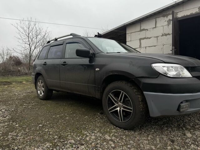 Черный Мицубиси Аутлендер, объемом двигателя 2.4 л и пробегом 3 тыс. км за 5208 $, фото 4 на Automoto.ua