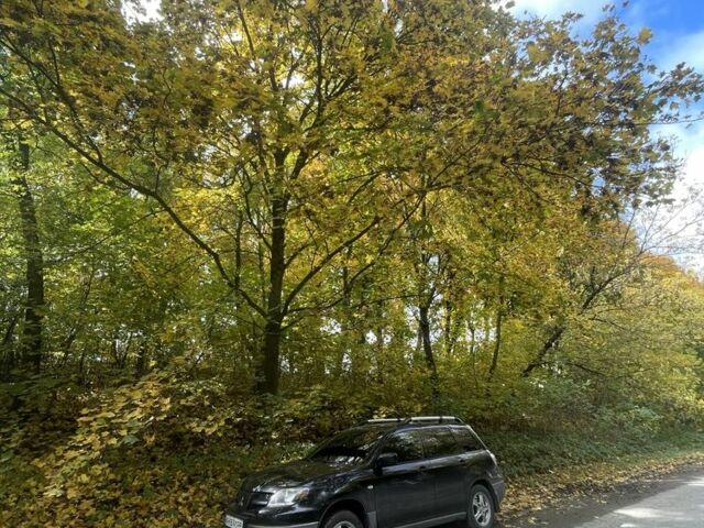 Чорний Міцубісі Аутлендер, об'ємом двигуна 2 л та пробігом 280 тис. км за 5701 $, фото 5 на Automoto.ua