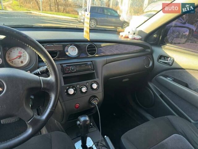 Черный Мицубиси Аутлендер, объемом двигателя 2.4 л и пробегом 351 тыс. км за 4999 $, фото 8 на Automoto.ua