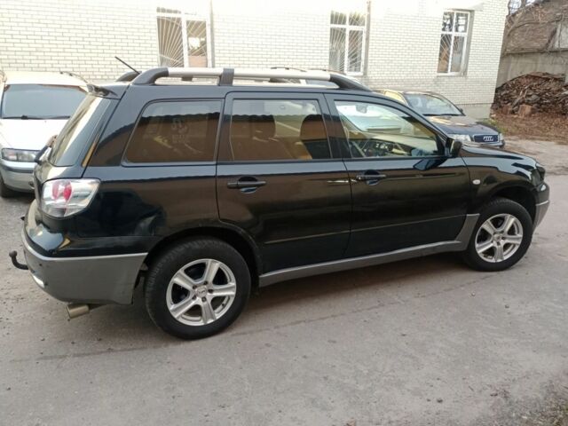 Чорний Міцубісі Аутлендер, об'ємом двигуна 0 л та пробігом 260 тис. км за 3750 $, фото 13 на Automoto.ua