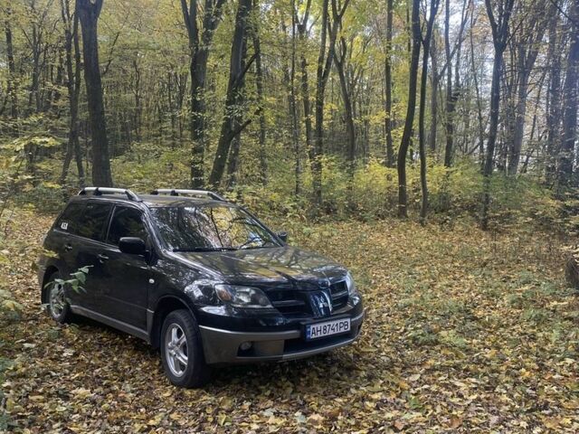 Чорний Міцубісі Аутлендер, об'ємом двигуна 2 л та пробігом 280 тис. км за 5701 $, фото 3 на Automoto.ua