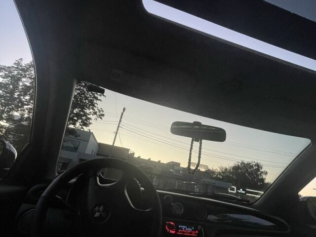 Чорний Міцубісі Аутлендер, об'ємом двигуна 2 л та пробігом 280 тис. км за 5701 $, фото 6 на Automoto.ua