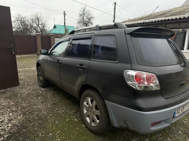 Черный Мицубиси Аутлендер, объемом двигателя 2.4 л и пробегом 3 тыс. км за 5208 $, фото 5 на Automoto.ua