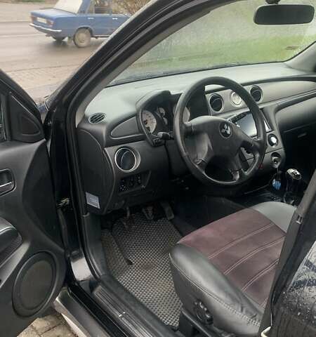 Черный Мицубиси Аутлендер, объемом двигателя 2 л и пробегом 300 тыс. км за 6500 $, фото 10 на Automoto.ua