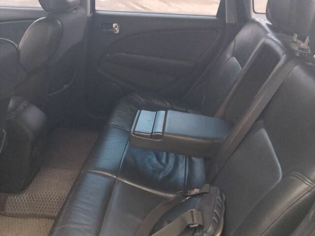 Черный Мицубиси Аутлендер, объемом двигателя 2.4 л и пробегом 3 тыс. км за 5500 $, фото 4 на Automoto.ua