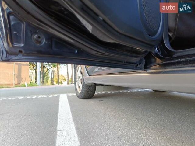 Черный Мицубиси Аутлендер, объемом двигателя 2.38 л и пробегом 243 тыс. км за 5450 $, фото 13 на Automoto.ua