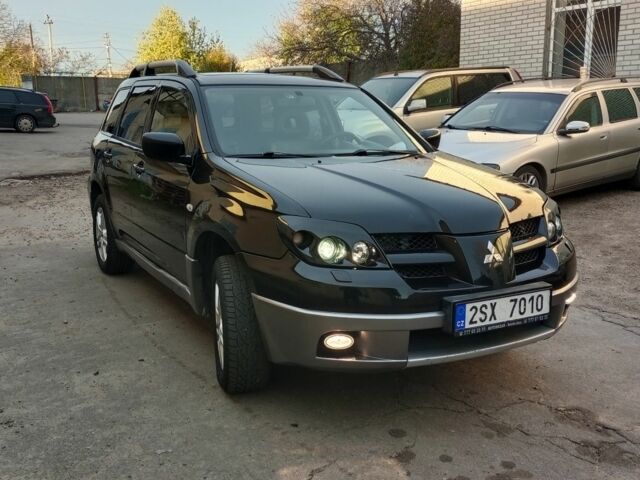 Чорний Міцубісі Аутлендер, об'ємом двигуна 0 л та пробігом 260 тис. км за 3750 $, фото 2 на Automoto.ua