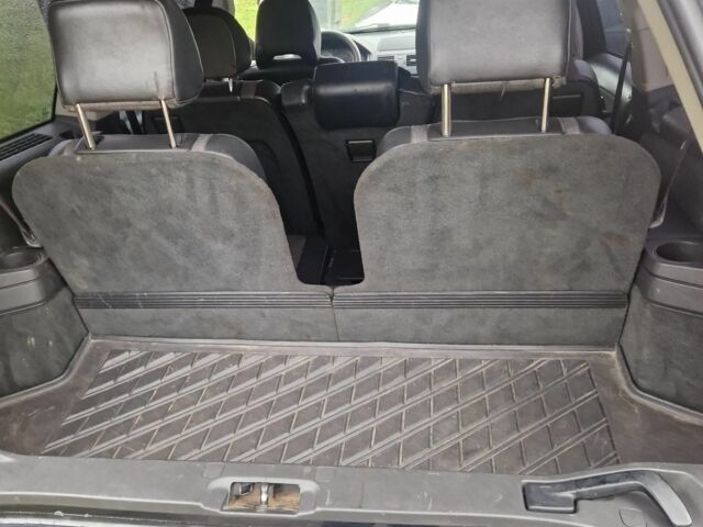 Черный Мицубиси Аутлендер, объемом двигателя 2 л и пробегом 299 тыс. км за 5400 $, фото 6 на Automoto.ua