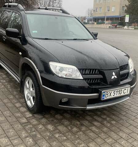 Черный Мицубиси Аутлендер, объемом двигателя 2 л и пробегом 300 тыс. км за 6500 $, фото 8 на Automoto.ua