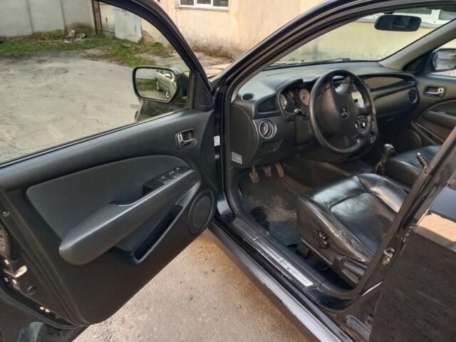 Черный Мицубиси Аутлендер, объемом двигателя 2.4 л и пробегом 243 тыс. км за 1846 $, фото 5 на Automoto.ua