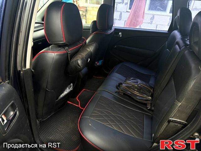 Черный Мицубиси Аутлендер, объемом двигателя 2.4 л и пробегом 357 тыс. км за 5190 $, фото 3 на Automoto.ua