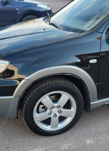 Міцубісі Аутлендер 2005 у Чернігові на Automoto.ua Чорний Міцубісі Аутлендер, об'ємом двигуна 2.38 л та пробігом 224 тис. км за 6000 $, фото 3 на Automoto.ua