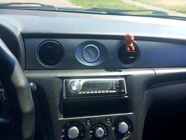 Черный Мицубиси Аутлендер, объемом двигателя 2.4 л и пробегом 270 тыс. км за 7800 $, фото 1 на Automoto.ua