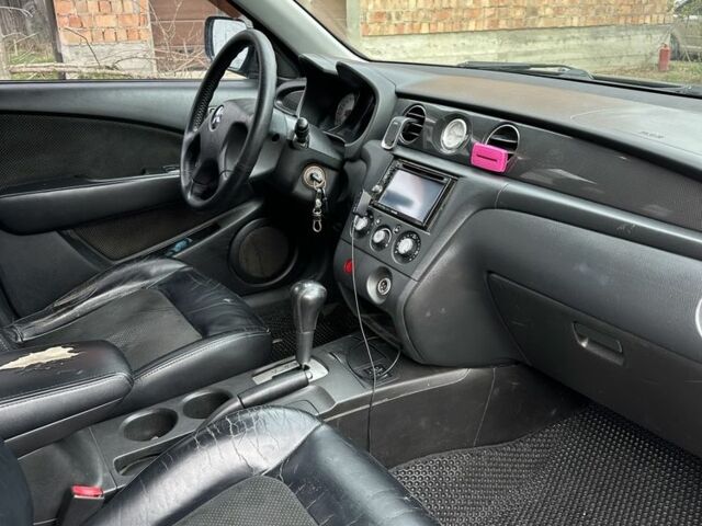 Черный Мицубиси Аутлендер, объемом двигателя 2.4 л и пробегом 258 тыс. км за 5400 $, фото 4 на Automoto.ua