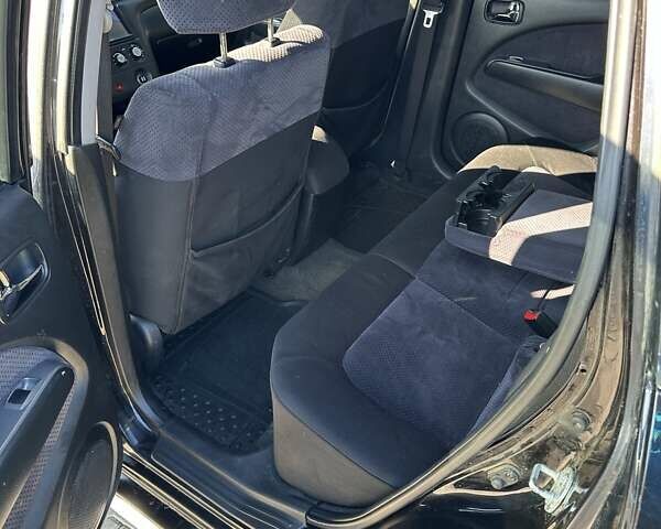 Черный Мицубиси Аутлендер, объемом двигателя 2.4 л и пробегом 307 тыс. км за 5600 $, фото 21 на Automoto.ua