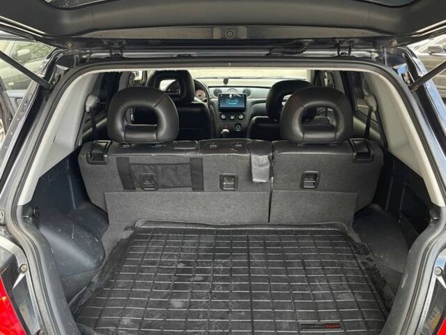 Черный Мицубиси Аутлендер, объемом двигателя 2.38 л и пробегом 270 тыс. км за 5900 $, фото 4 на Automoto.ua