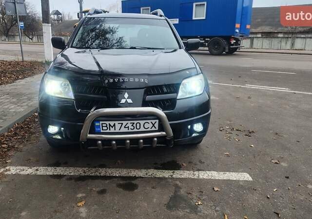 Черный Мицубиси Аутлендер, объемом двигателя 2 л и пробегом 330 тыс. км за 4997 $, фото 8 на Automoto.ua