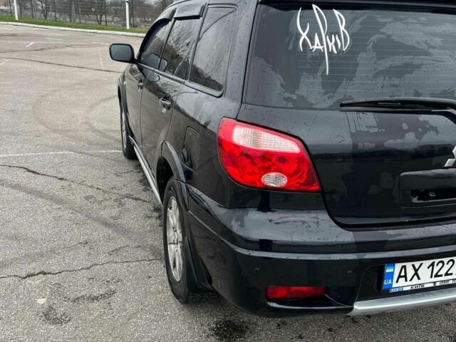 Черный Мицубиси Аутлендер, объемом двигателя 2.4 л и пробегом 190 тыс. км за 6800 $, фото 7 на Automoto.ua