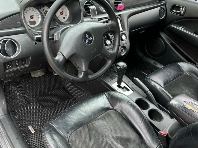 Черный Мицубиси Аутлендер, объемом двигателя 2.4 л и пробегом 258 тыс. км за 5400 $, фото 5 на Automoto.ua