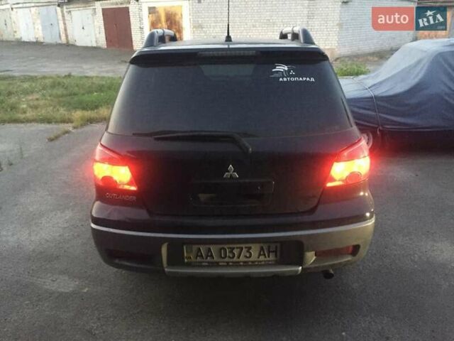 Чорний Міцубісі Аутлендер, об'ємом двигуна 2 л та пробігом 310 тис. км за 6500 $, фото 9 на Automoto.ua