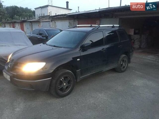Чорний Міцубісі Аутлендер, об'ємом двигуна 2 л та пробігом 310 тис. км за 6500 $, фото 7 на Automoto.ua