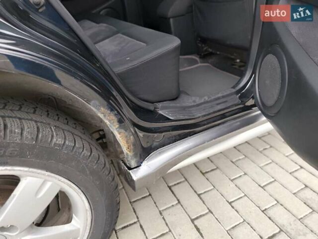 Черный Мицубиси Аутлендер, объемом двигателя 2 л и пробегом 270 тыс. км за 5300 $, фото 11 на Automoto.ua