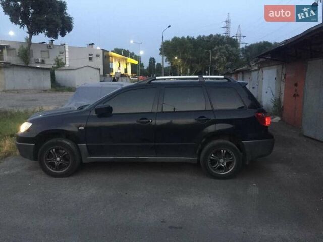 Чорний Міцубісі Аутлендер, об'ємом двигуна 2 л та пробігом 310 тис. км за 6500 $, фото 5 на Automoto.ua