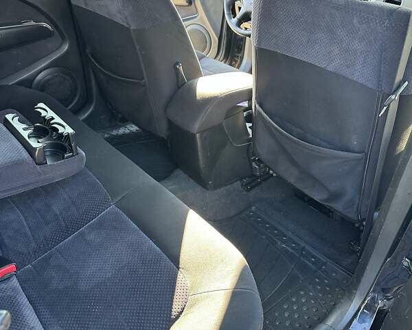 Черный Мицубиси Аутлендер, объемом двигателя 2.4 л и пробегом 307 тыс. км за 5600 $, фото 20 на Automoto.ua